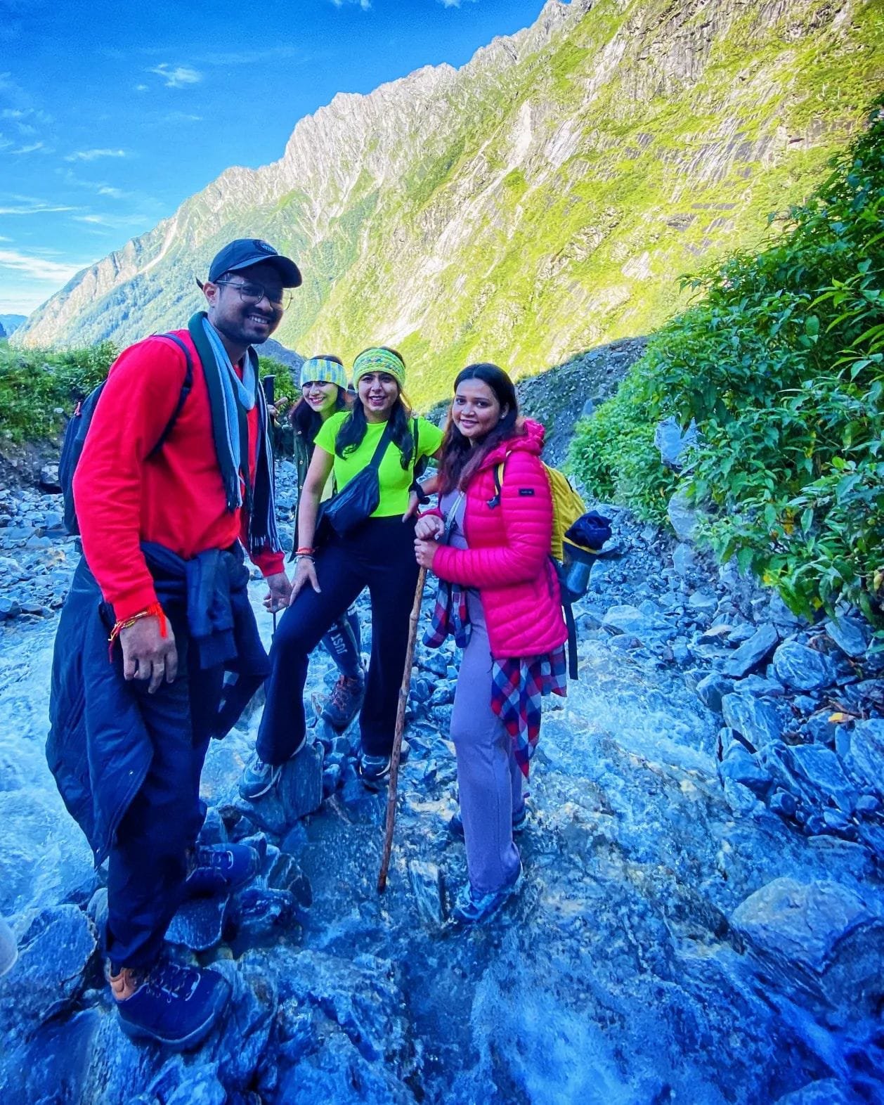 Group crossing a glacial stream